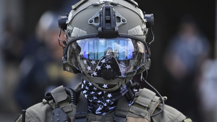 State your case: Should officers face charges for wearing face coverings during operations?