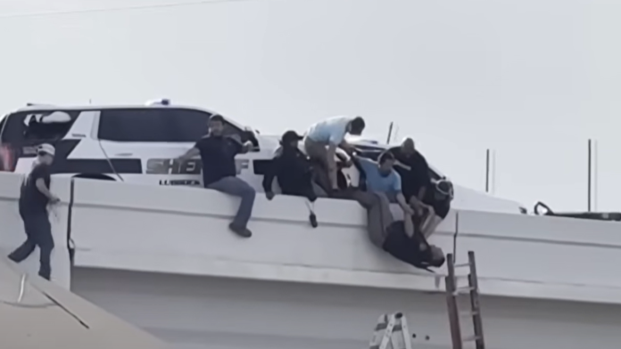 Watch: Bystanders rescue Texas deputy dangling from overpass after semi hits cruiser