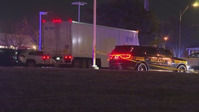 Semi-truck driver rams multiple cruisers, injures 2 Ohio officers before being shot